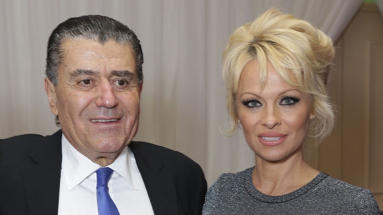 Actress Pamela Anderson with Haim Saban at the Friends Of The Israel Defense Forces (FIDF) Gala in 2014. 