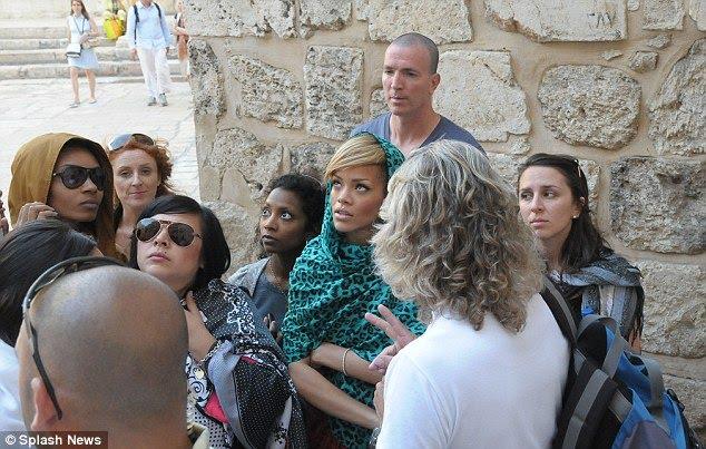 Rihanna visiting various holy sites throughout Israel, while on her tour of the country